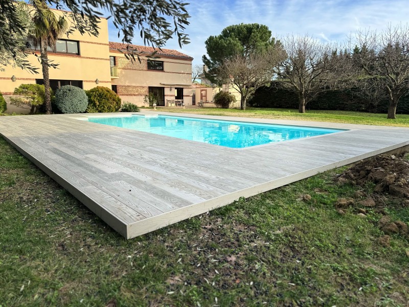 Réalisation terrasse minérale imitation bois sur la commune de Toulouse